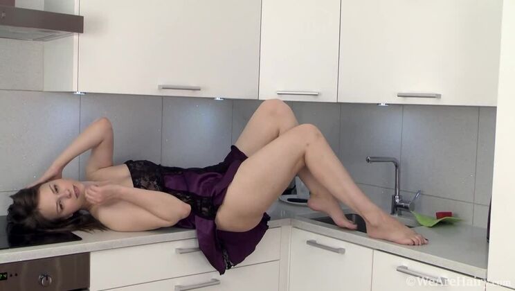 Beata strips nude in her kitchen to unwind
