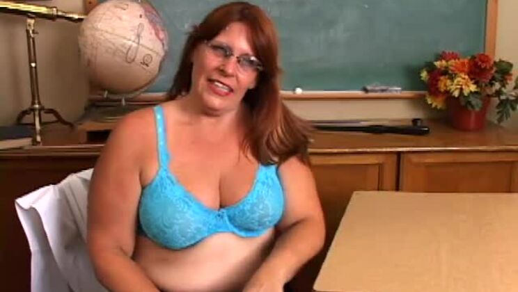 Leighanne lubes up her dildo in class