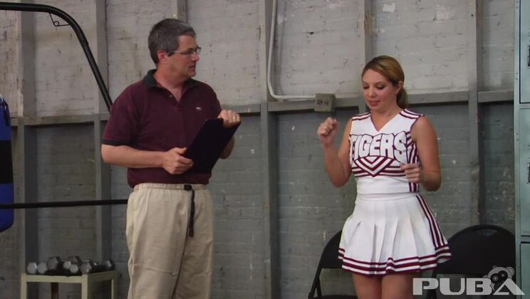 Stacked cheerleader gives her coach a special handjob!