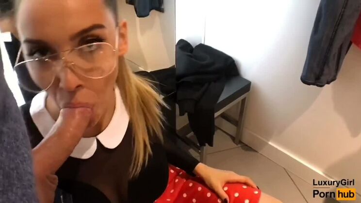 Public Blowjob in a Clothing Store. A Young Baby With Glasses Swallows Cum.