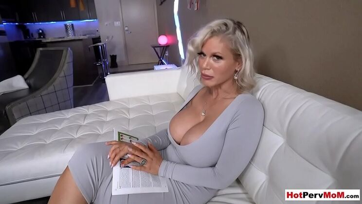 Busty blonde MILF stepmom gives handjob to stepson