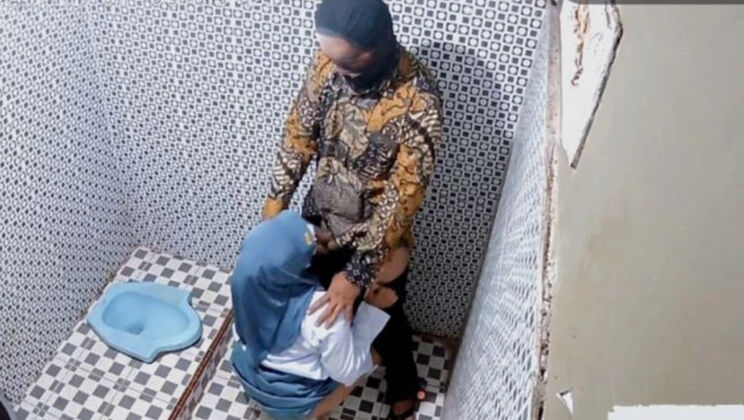 Indonesian Hijab Teacher Fucks Student in Public Toilet - Clarelia Jamsen Blowjob Viral