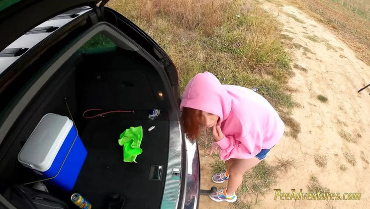 Smoking Redhead with Full Bladder Pisses Outdoors